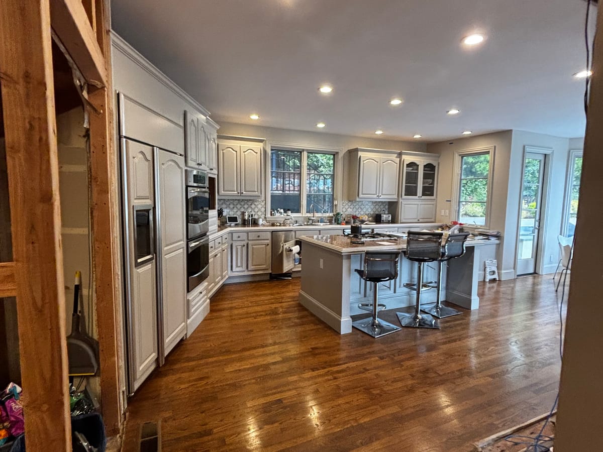 Clean restored kitchen and living area after mitigation